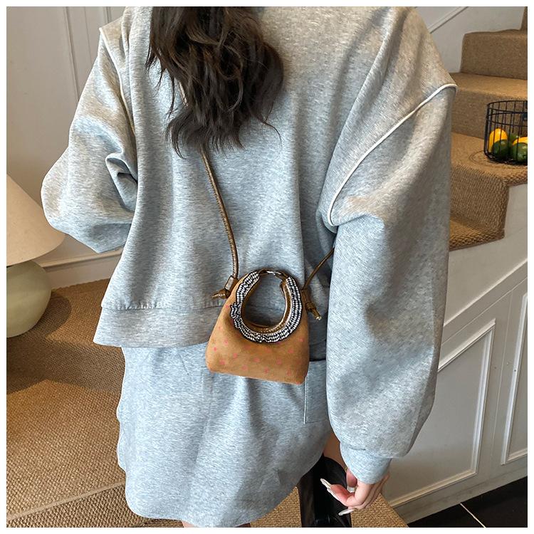 Niche mini bag women's summer new fashion messenger bag high-end portable dumpling bag