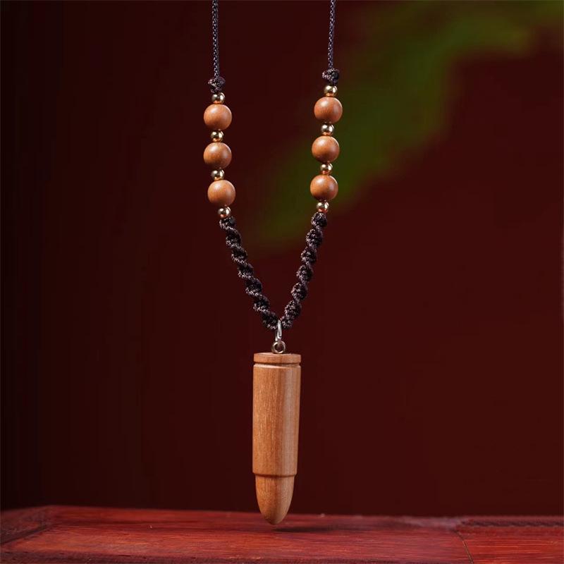 

Подвеска-пуля из индийского сандала с дизайном волка Pure Natural