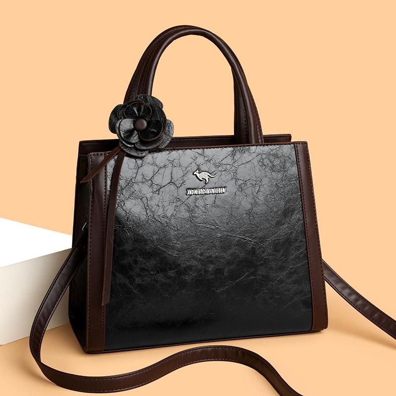 Elegant Faux Leather Tote Bag with Flower Decoration and Adjustable Shoulder Strap