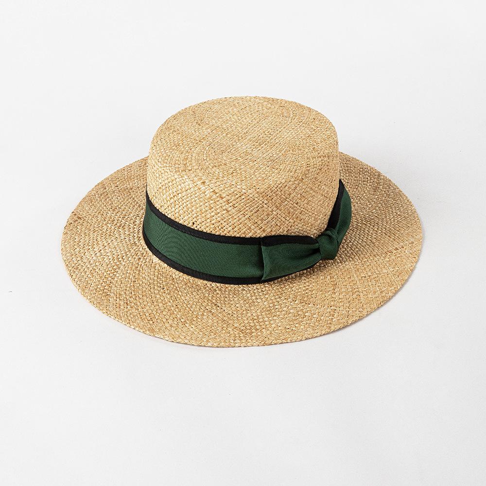 Spring and summer new fashion two-color webbing bow treasure grass wide brim flat top hat outdoor shopping sun protection straw hat