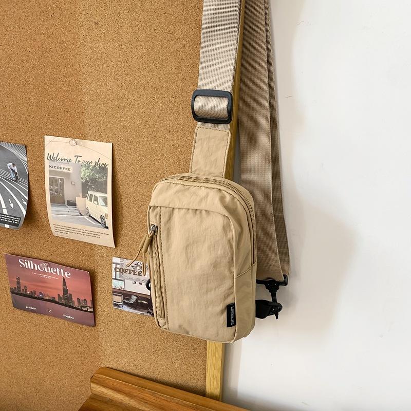 Simple trend casual personality men's breast bag Japanese light shoulder small backpack women's leisure sports messenger bag