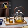 Pokaro Tea Heat-Resistant Glass Teapot, 1140ml, Integrated Steaming Function, Ink-Colored Design, Glass Tea Strainer, Wooden Handle, Stovetop Safe,