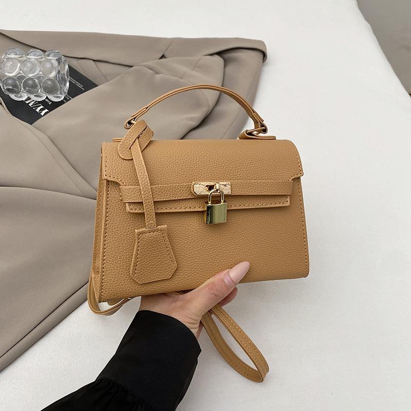 High-end women's handheld Kelly bag new trendy spring and summer bag fashion niche design crossbody bag
