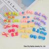 Bowknot Resin Accessories: Vibrant DIY Hair Clips, Phone Case Charms, Fridge Magnets, Crocs Decorations, and Car Adornments.