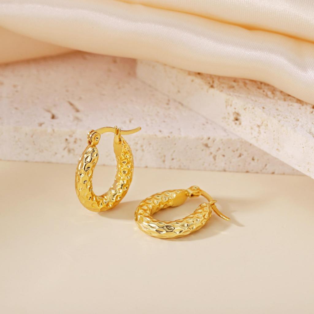 Orecchini a Cerchio Geometrici Intrecciati Europei e Americani in Acciaio al Titanio - Design Elegante e Unico per Donna