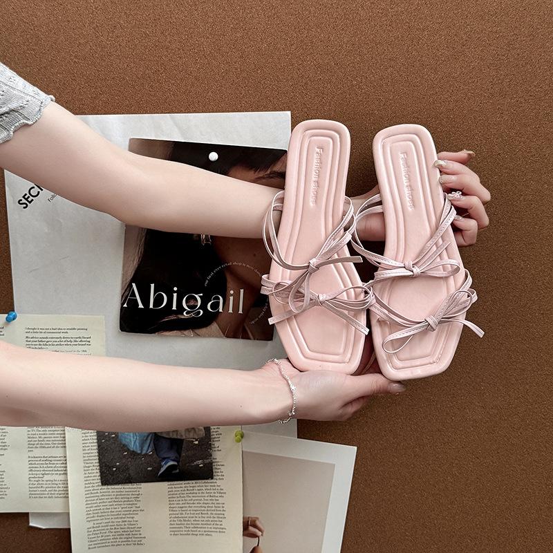 Stylish and simple versatile strap bow with open-toed cool slippers women's 2025 summer new flat-bottomed slippers