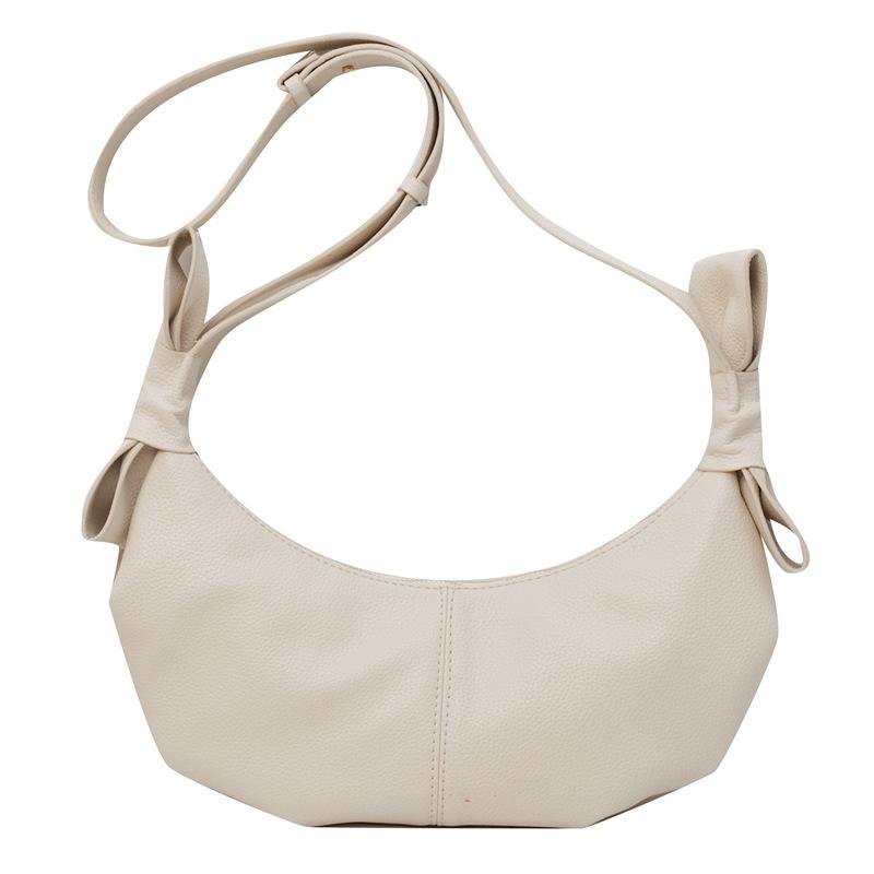 This year, the popular small bag women's 2025 spring new messenger bag high-end texture versatile single shoulder crescent dumpling bag
