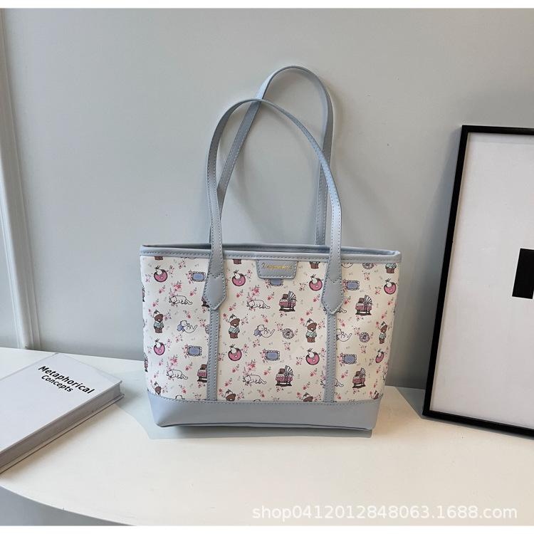 

Вместительная сумка под мышкой женская 2025 новая весенне-летняя модная сумка на плечо с принтом универсальная сумка-тоут для通勤 синий