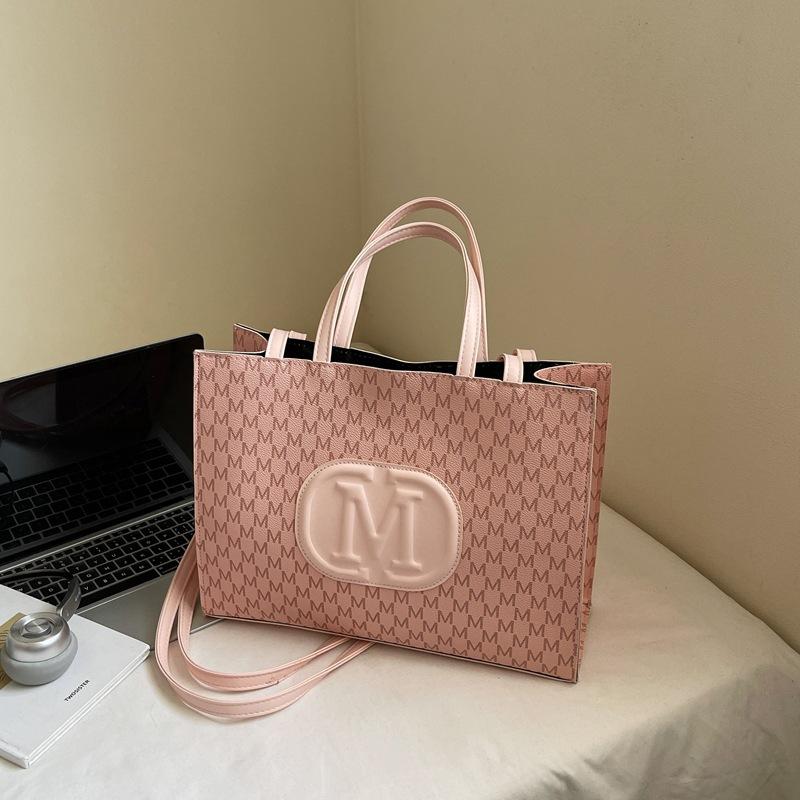 

Light luxury tote bag 2025 new high-end fashion printing portable shoulder armpit large-capacity women s bag рожевий