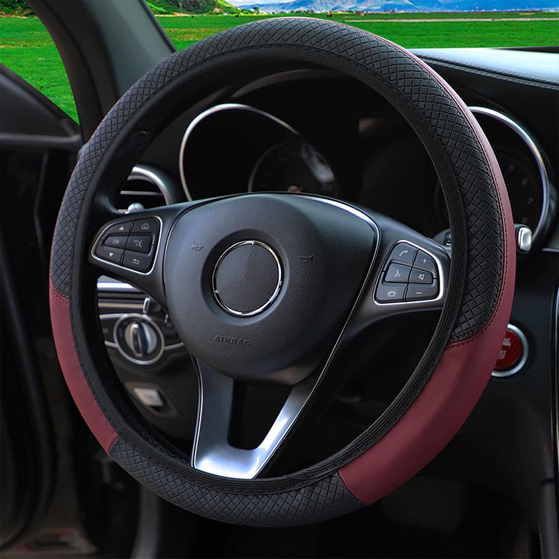A PU leather plaid emboweled ultra-thin stretch car steering wheel cover without inner rim fits 14.5- to 15-inch car interiors