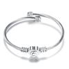 Stylish Women's Bracelet: Stainless Steel Peach Heart with Braided Cable and European-American 26 Letters Design