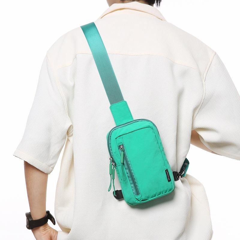 Simple trend casual personality men's breast bag Japanese light shoulder small backpack women's leisure sports messenger bag