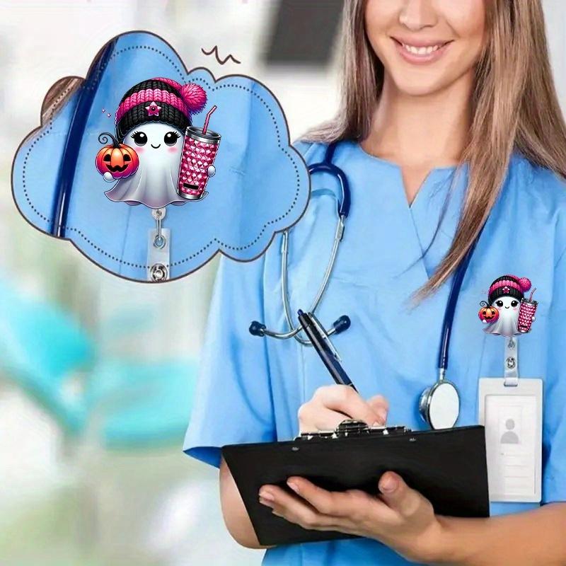 Unique Halloween ghost ID badge clip with heart anatomy design. Perfect nurse/doctor gift.