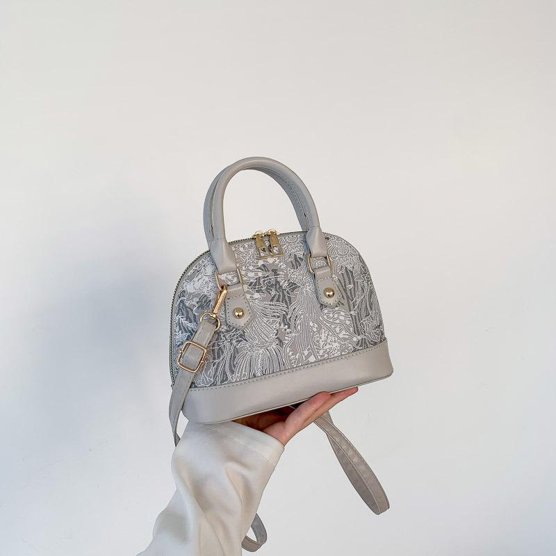 Today's fashion and simple handbags, summer women's gentle temperament, shoulder messenger bag, shell bag tide