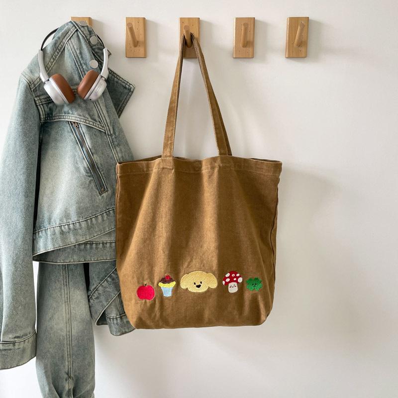 Casual canvas bag design sense niche women's bag 2025 new cartoon printed tote bag large capacity shoulder bag