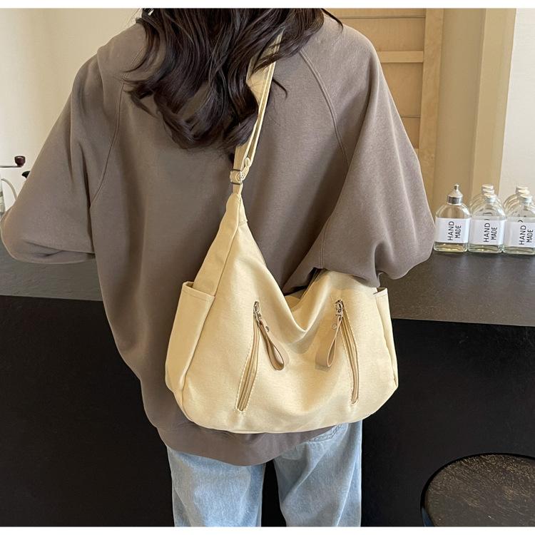 

Shoulder bag women s large capacity 2025 new solid color versatile Korean version casual large capacity messenger bag canvas dumpling bag хаки