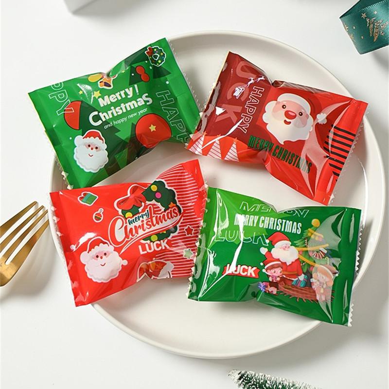 100Pcs 7x10cm Plastic Christmas Machine Sealed Bags Snowflake Pastry Candy Cookie Xmas Party Gift Packaging Supplies