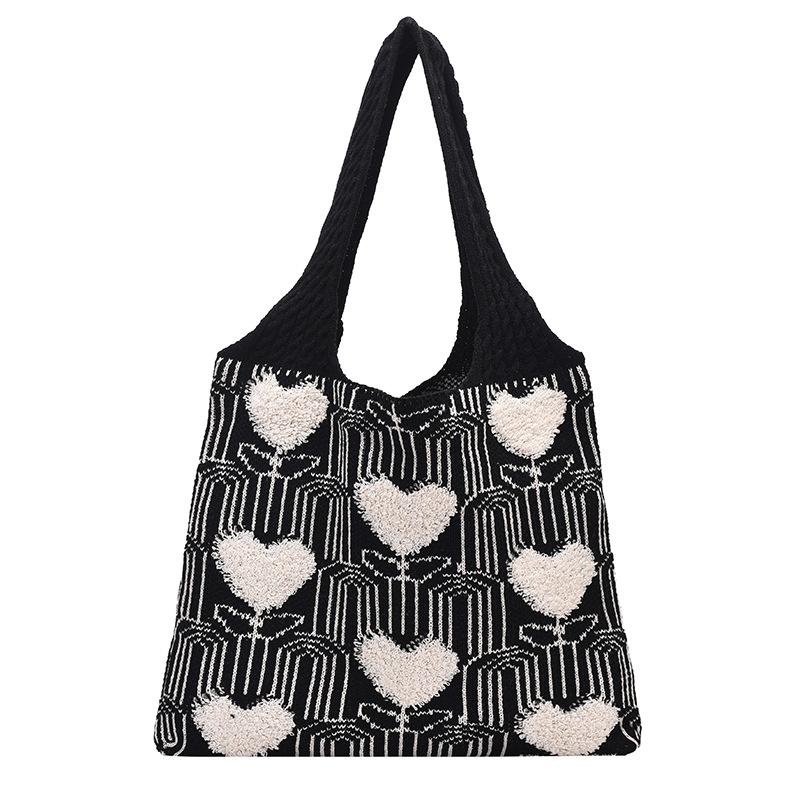 

Cute and exquisite knitted heart-shaped small flower hollow vertical women s armpit bag spring new women s shoulder handbag
