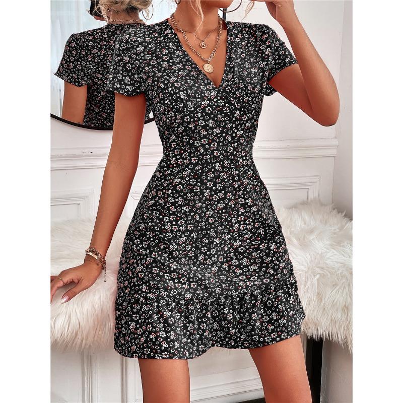 Abito estivo di tendenza europeo e americano sexy con scollo a V profondo e piccolo motivo floreale, elegante, da donna