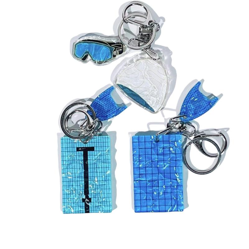 1 st Simmössa Bilnyckelring Kreativ Simbassäng Vågformad Nyckelring Dekoration Väskhänge Simmarens Gåva