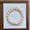 Classic Threaded Natural Pearl Freshwater pearl bracelet with elastic cord, irregularly shaped, copper-plated gold beads, Baroque style