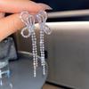 High-End Heart Tassel Earrings: Slimming, Long Dangle for Round Faces - Luxurious and Niche Design
