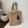Bolso de paja tejido de nicho para mujer, nuevo popular de verano, bolso de hombro versátil, bolso tote tejido de gran capacidad, bolso de playa