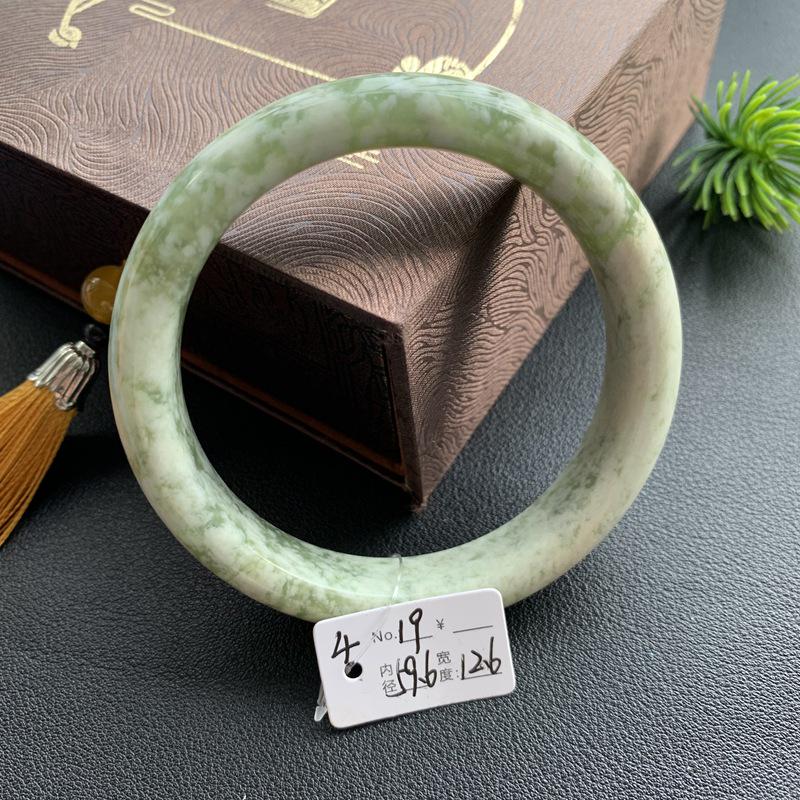 A4 Emerald Green Hetian Jade Bracelet with Floral Design