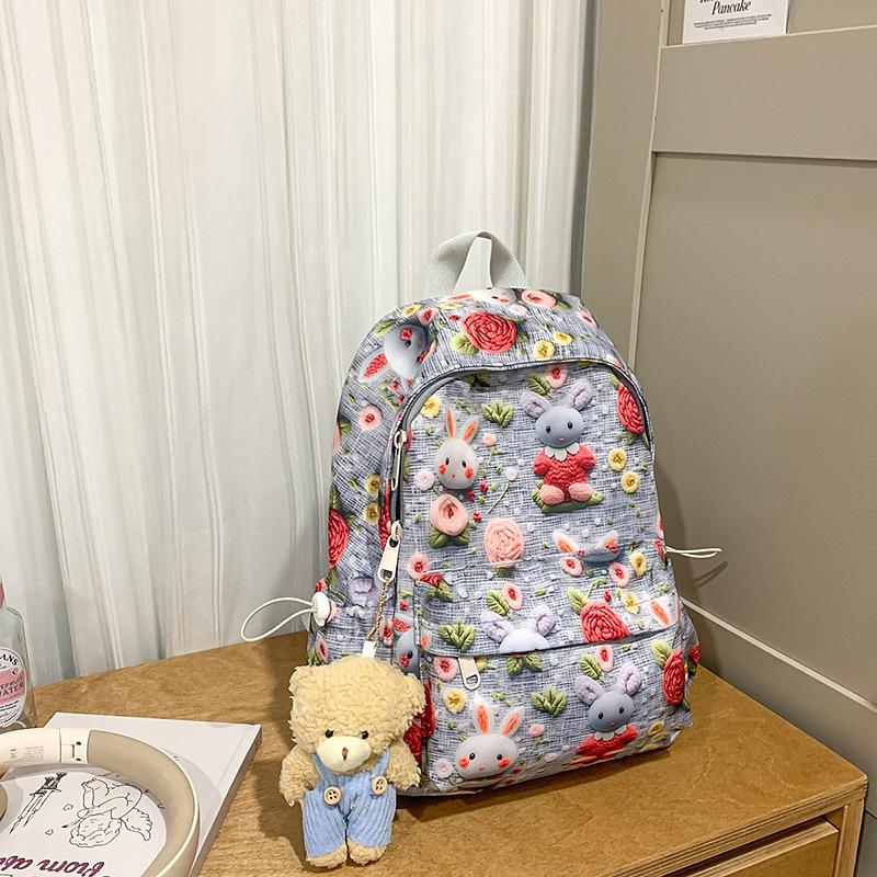 New Lightweight Student Backpacks for Both Boys and Girls  Printed Student Backpack  Female Student Spring Outing Backpack