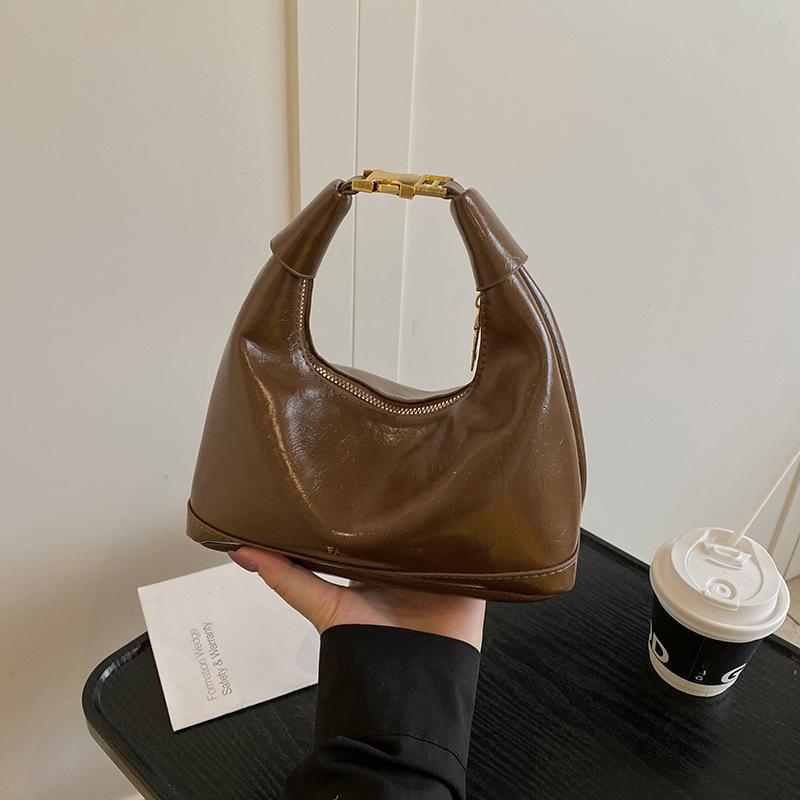

Premium sense retro handbag female 2025 autumn and winter new fashion versatile commute to work oblique span dumpling bag