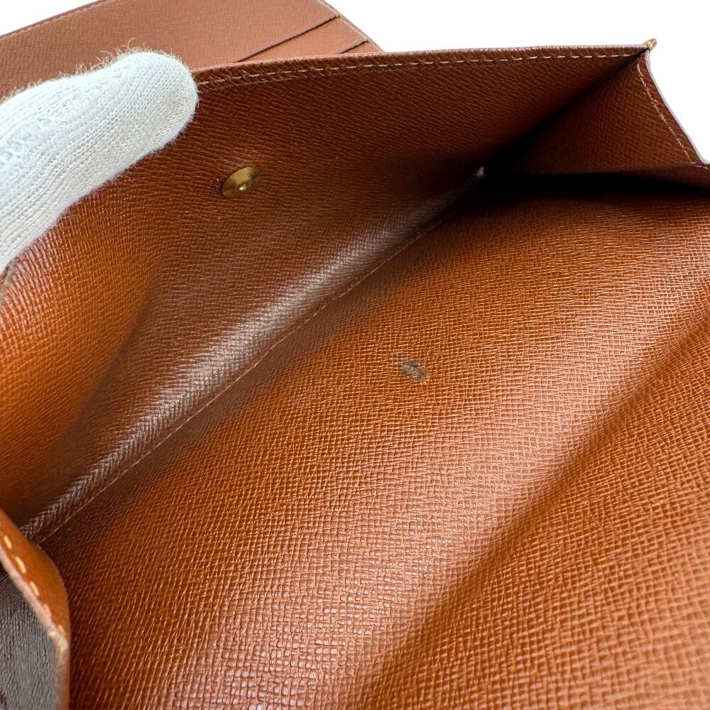 LOUIS VUITTON M61215 Monogram leather Portefeuille International Purse Sunburn leather Women Used