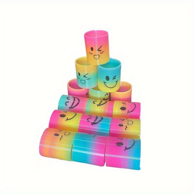Bunte Plastik-Spiralfeder-Spielzeuge-Happy Face Regenbogen-Designs, für Geburtstags-Partygeschenke, Halloween- und Weihnachtsgeschenke, Karnevalspreise