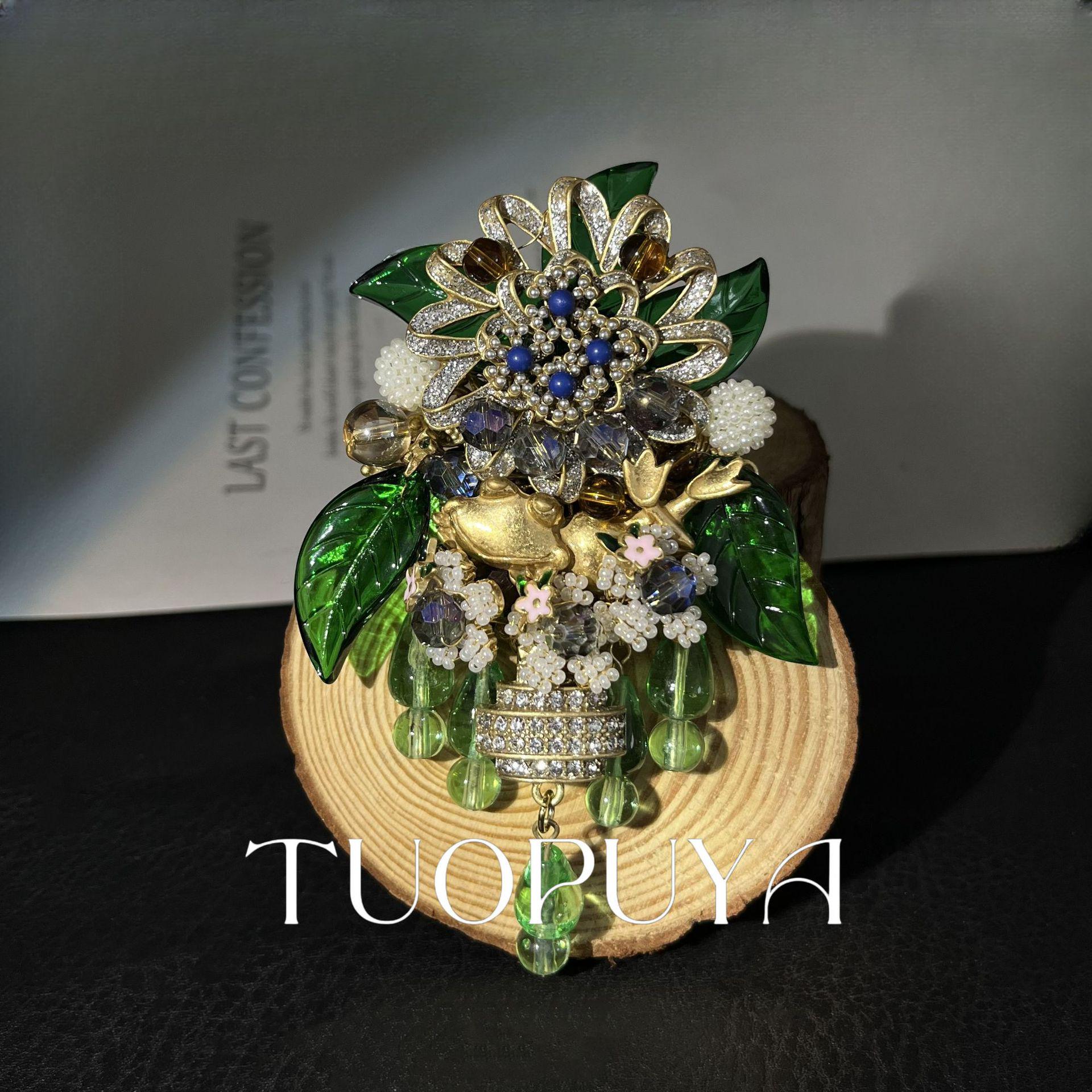 Retro Hand-Woven Floral Brooch with Green Leaf Glass Pendant