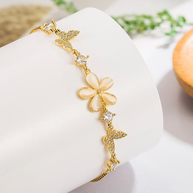 

Модный женский браслет с кристаллами в виде бабочки и цветка one size