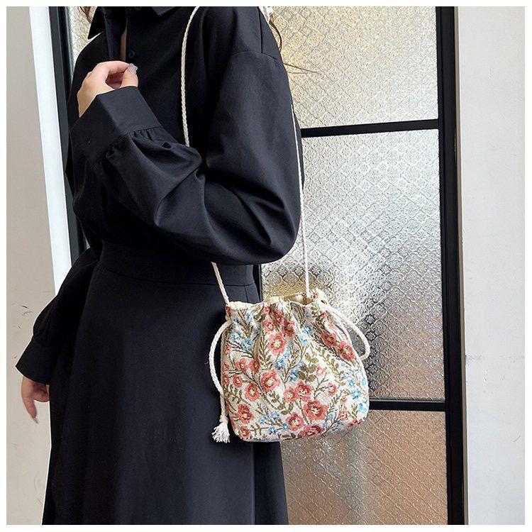 Umhängetasche Kordelzug Canvas Damentasche Blumenstickerei Ethno-Stil Kleine Tasche Crossbody Bucket Bag
