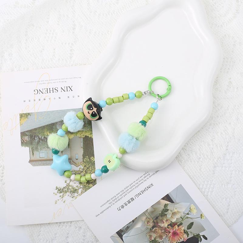 Flying Police Officer Doll Keychain with Bead Pom-Pom - Handmade and Cute Pendant for Bags or Phones