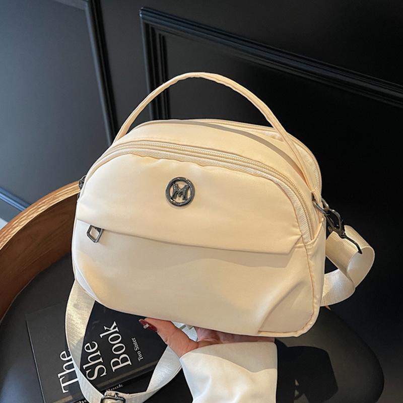 

Женская сумка 2025 новая наплечная сумка женская модная простая брызгозащищенная нейлоновая многослойная легкая сумка для мобильного телефона