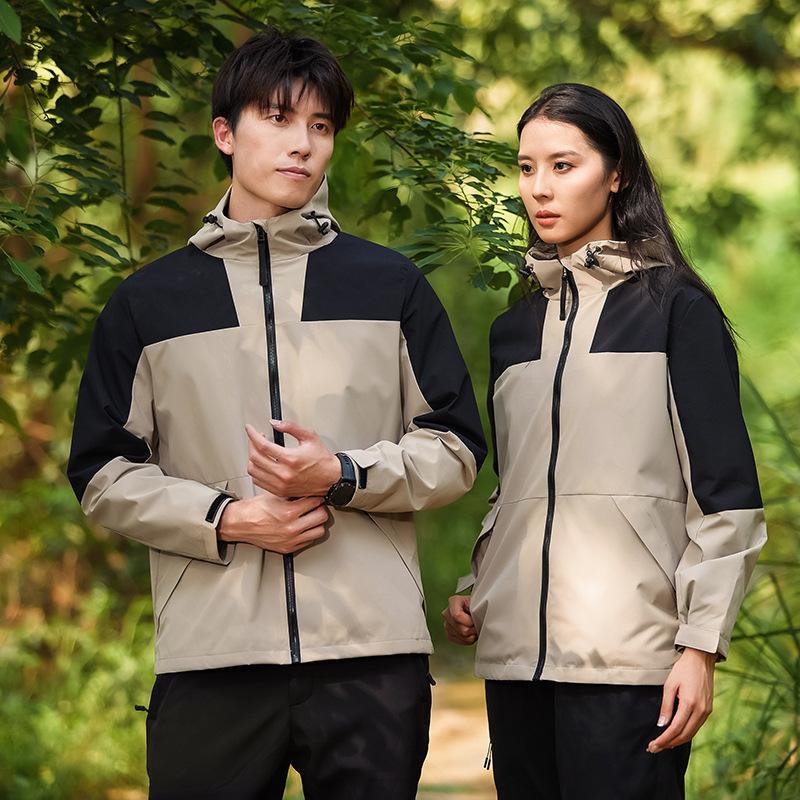 Veste d'extérieur pour hommes et femmes Printemps et Automne Assortiment de couleurs Nouvelle Vêtement d'alpinisme coupe-vent et imperméable Veste à capuche simple