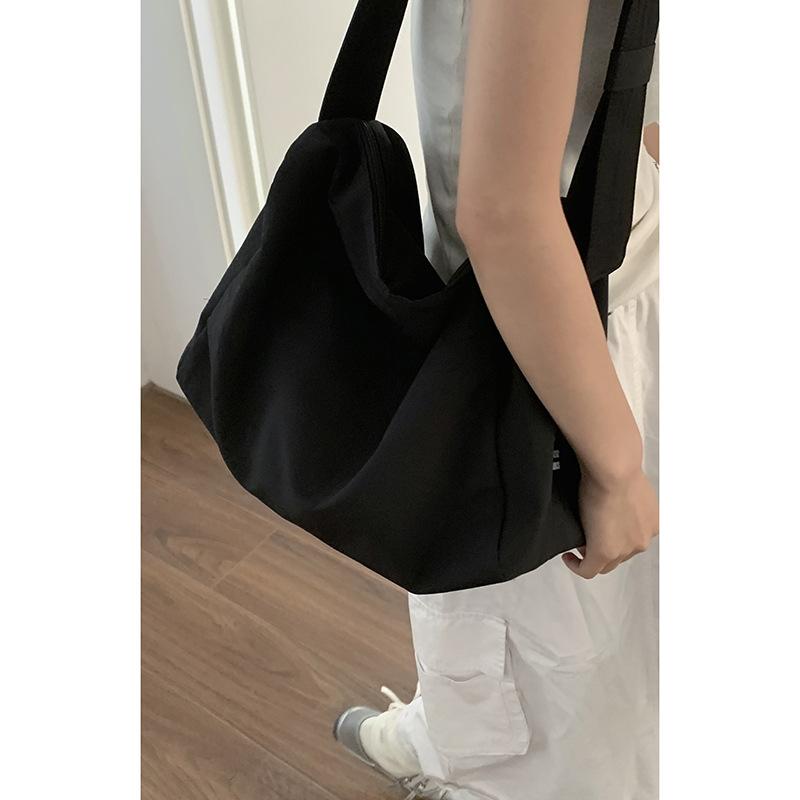 College-stil avslappet lerretspose dame 2025 ny enkel totebag allsidig stor kapasitet skulderveske puteveske