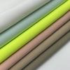 In-Stock 100D Four-Way Stretch Woven Polyester-Spandex Plain Weave Fashion Fabric for Pants and Shirts