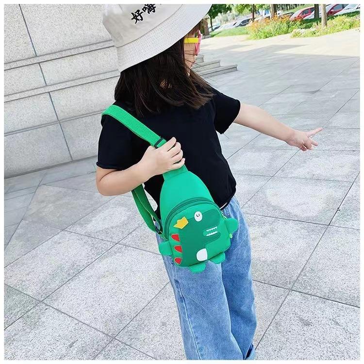 Borsa a tracolla per bambini con stampa di dinosauri, simpatico marsupio a cartoni animati per ragazzi e ragazze, borsa a tracolla leggera per l'uso quotidiano