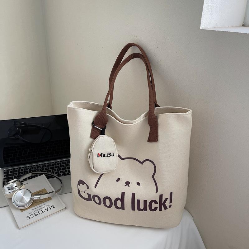 Japanese canvas bag women's shoulder bag 2025 summer new literary style large-capacity simple portable printed canvas bag