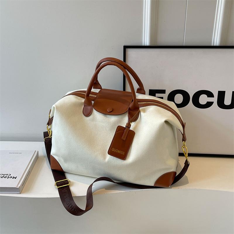 Travel bag Women's large capacity fashion lightweight short-haul luggage bag Portable outdoor portable fitness bag Birth storage bag