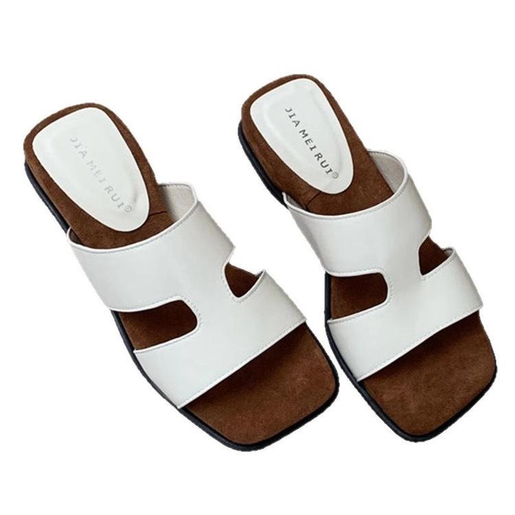 Design sense niche wedge heel slippers women's summer wear 2025 new high-end cool slippers vacation beach shoes