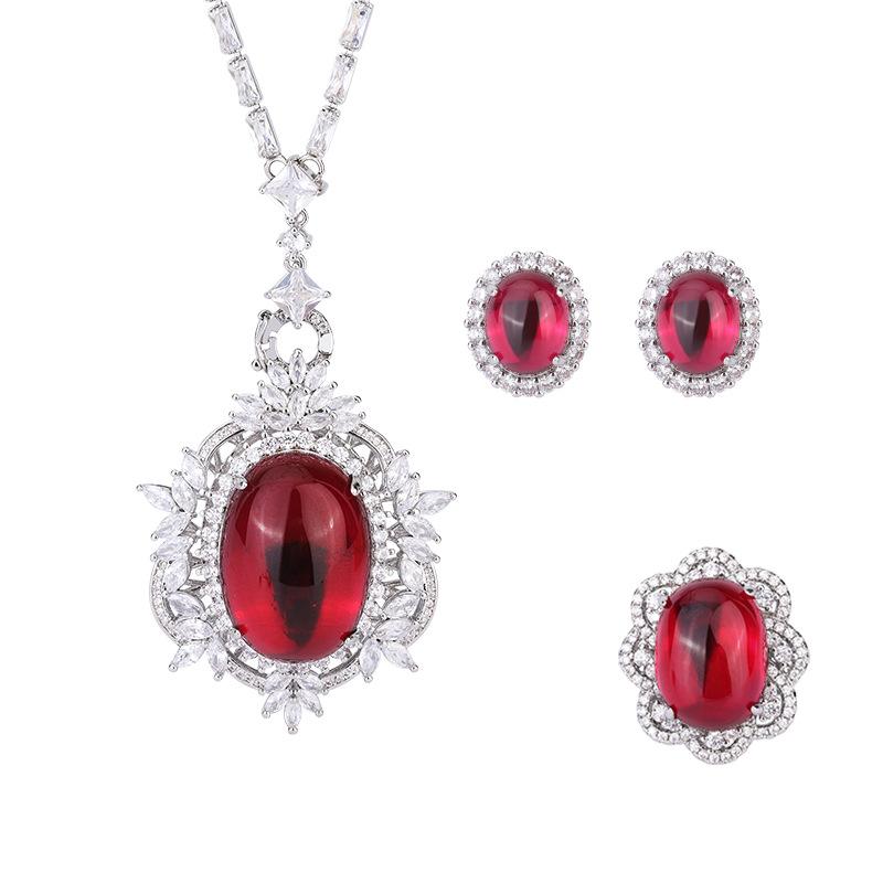 Schmuck Kupferboden Vergoldet Retro Denier-Form Roter Korund Schlichte Oberfläche Voll Diamant Inlay Set Hauptstein