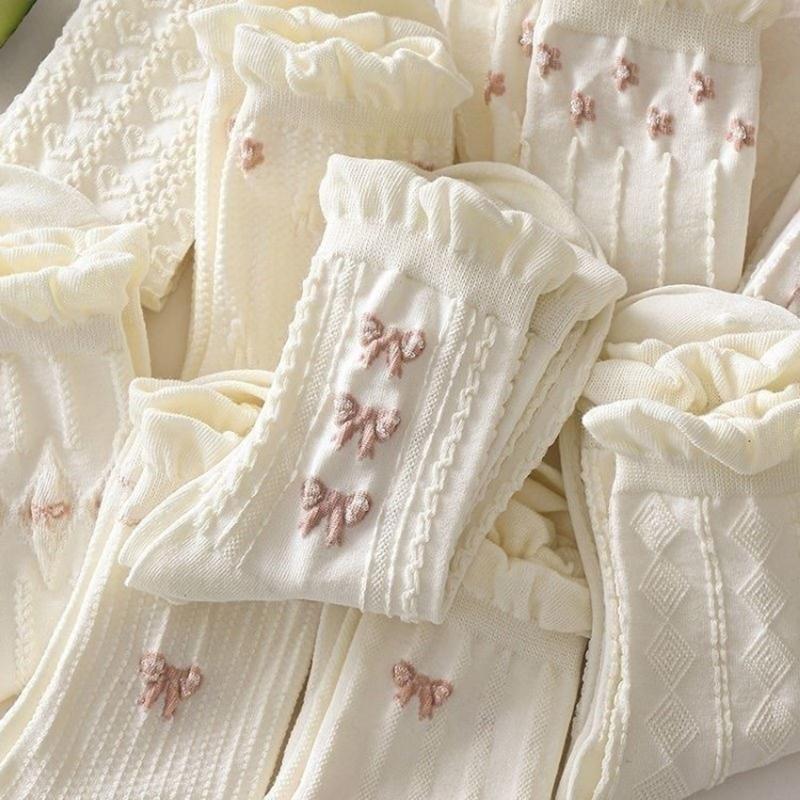 Chaussettes blanches simples, polyvalentes, jolies, nœuds papillon, petites fleurs, chaussettes tube moyennes pour femmes, Kawaii Harajuku Jk Lolita, chaussettes en coton pour filles