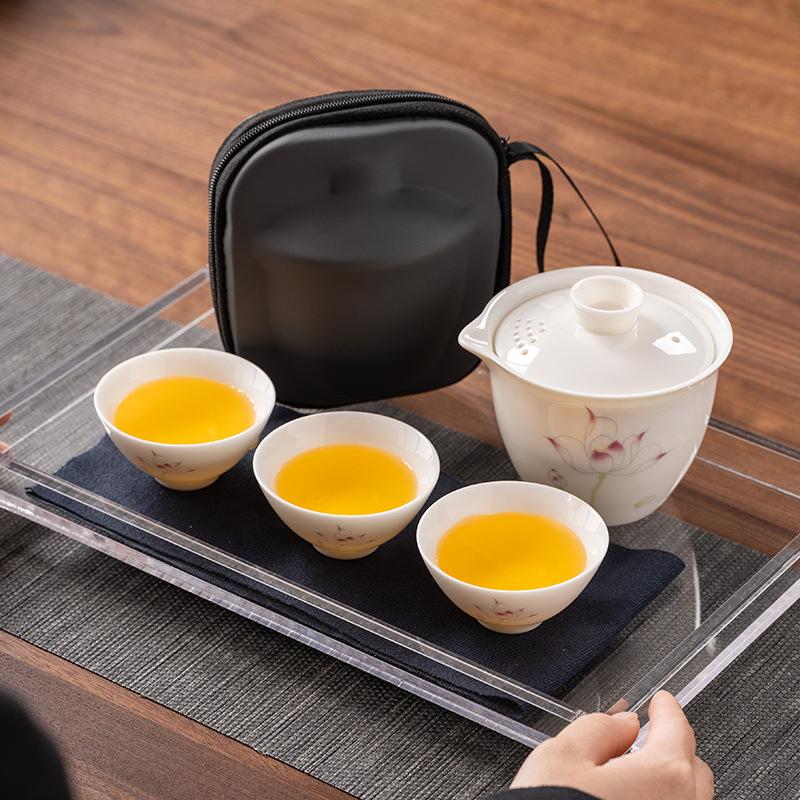 Suet jade porcelain high-end travel tea set, a pot of three cups, portable set, light luxury business commemorative holiday gifts