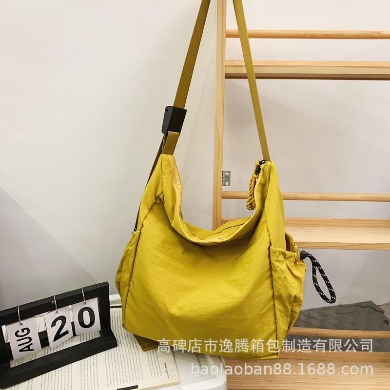 

New large-capacity commuter high-end big bag women s 2024 new casual messenger shoulder bag messenger bag жовтий