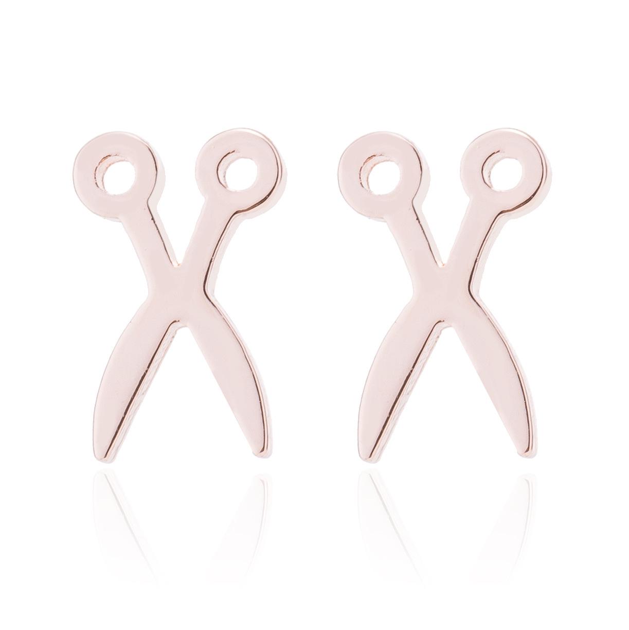 

Різдвяні сережки-пусети з нержавіючої сталі: Голова оленя, Ведмежа лапа, Журавлик орігамі, Квітка троянди, Геометричні дизайни серця.