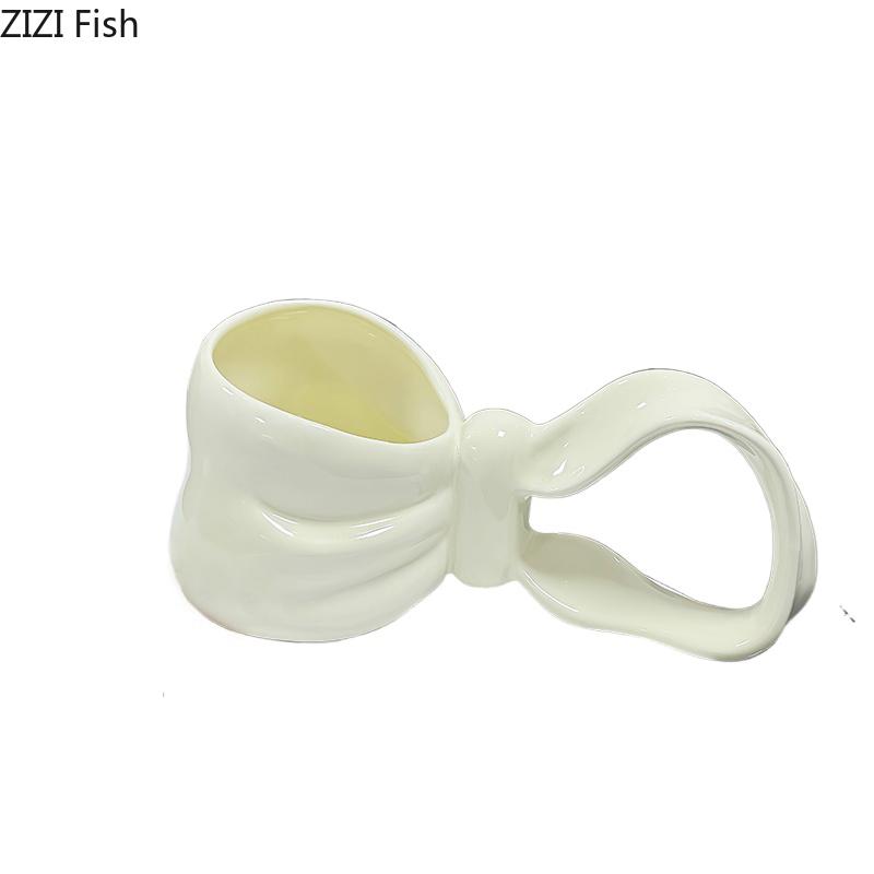 Kreative Schleifenform Keramiktasse Schleifengriff Kaffeetasse Esstisch Milchbecher Nachmittagstee Teetasse Fruchtsaftbehälter